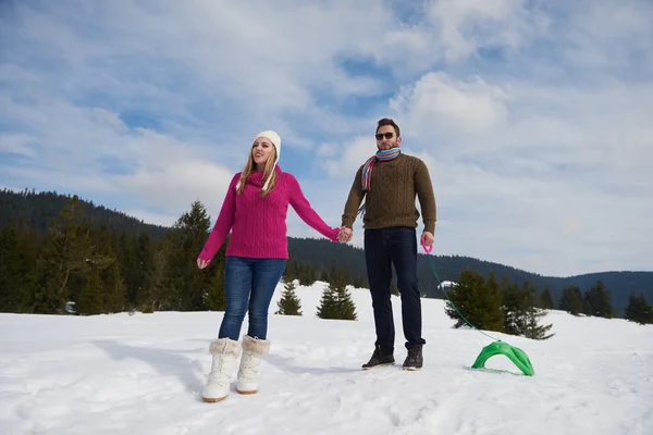 Couple having fun on fresh show on winter vacation — Stock Photo, Image