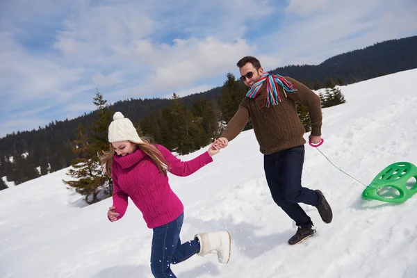 Couple having fun on fresh show on winter vacation — Stock Photo, Image