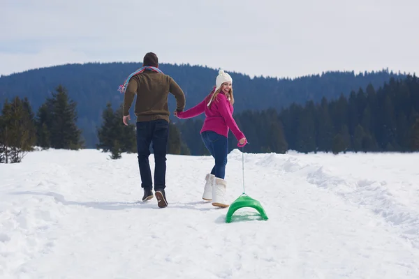 Couple having fun on fresh show on winter vacation — Stock Photo, Image