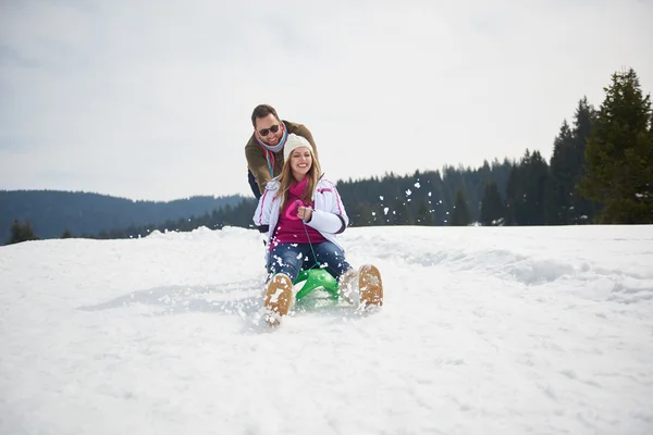 Couple having fun on fresh show — Stock Photo, Image