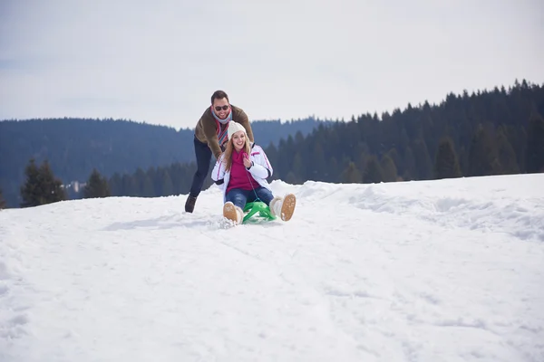 Couple having fun on fresh show — Stock Photo, Image