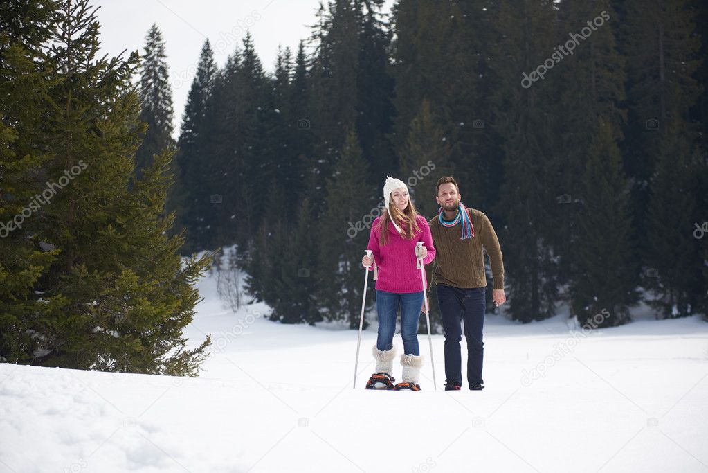 couple having fun on fresh snow