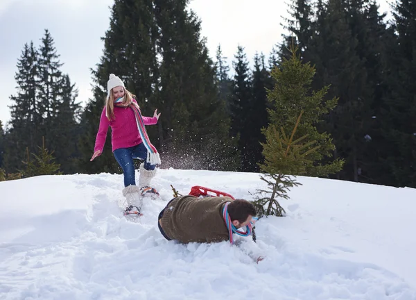 Couple having fun in snow — Stock Photo, Image