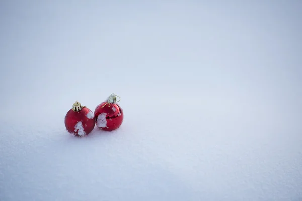 Christmas balls in snow — Stock Photo, Image