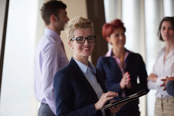 Diverse business people group with blonde  woman in front — Stock Photo, Image