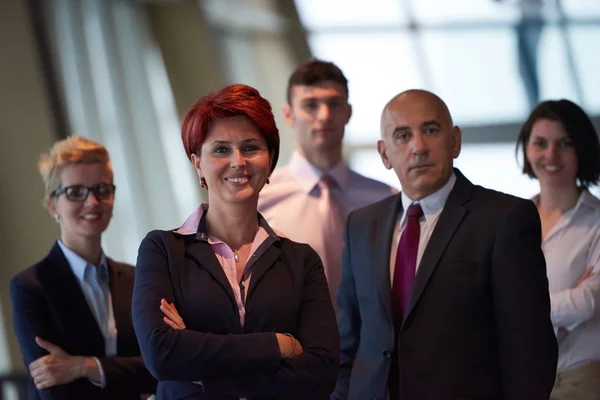 Diverse business people group with redhair  woman in front — Stock Photo, Image