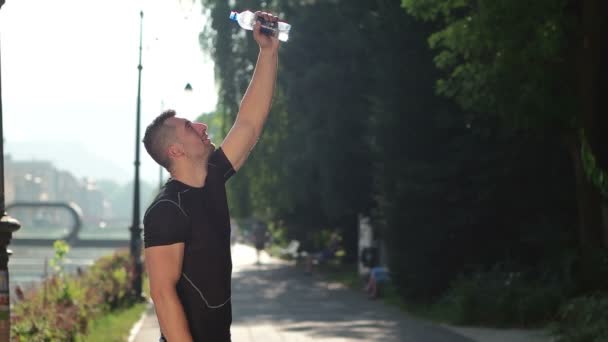 Portrait of handsome jogger at morning — Stock Video