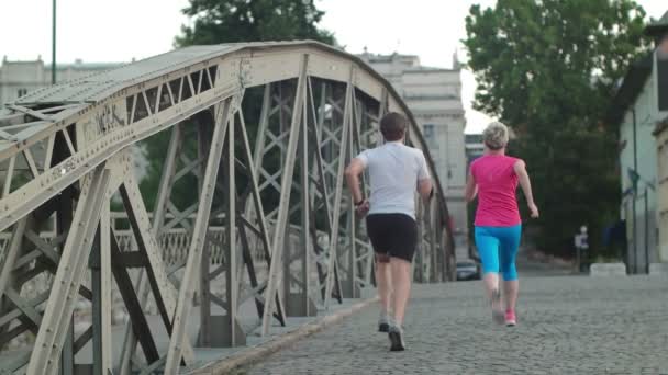 Здоровий пара біг підтюпцем — стокове відео