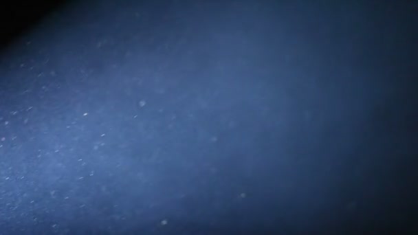 Karanlık parçacık sorunsuz arka planda toz — Stok video