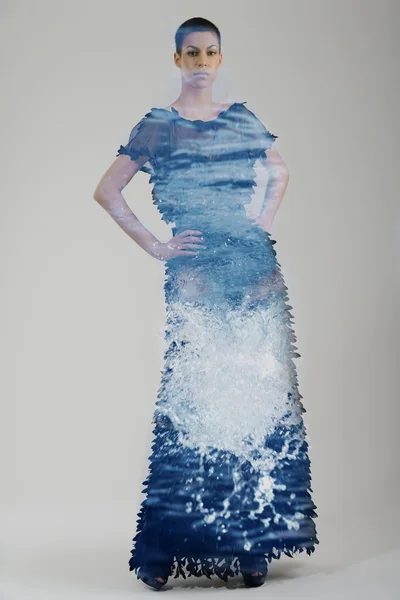 Double exposure of elegant woman in fashionable dress — Stock Photo, Image