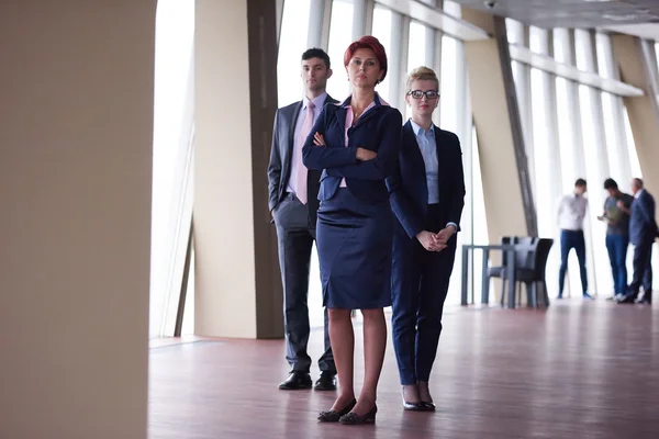 Diverse business people group with red hair  woman in front — Stock Photo, Image
