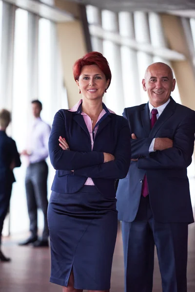 Diverse business people group with red hair  woman in front — Stock Photo, Image