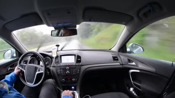 Man driving a car with gps navigation system — Stock Video