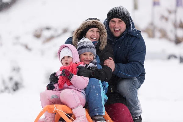 Happy Young Family Portrait Winter Vacation While Sitting Sledge Landscape — Stock Photo, Image