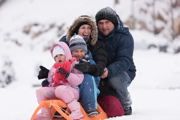 Happy Young Family Portrait Winter Vacation While Sitting Sledge Landscape — Stock Photo, Image