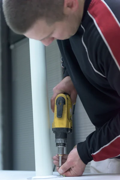 Repairman working with drilling machine — Stock Photo, Image