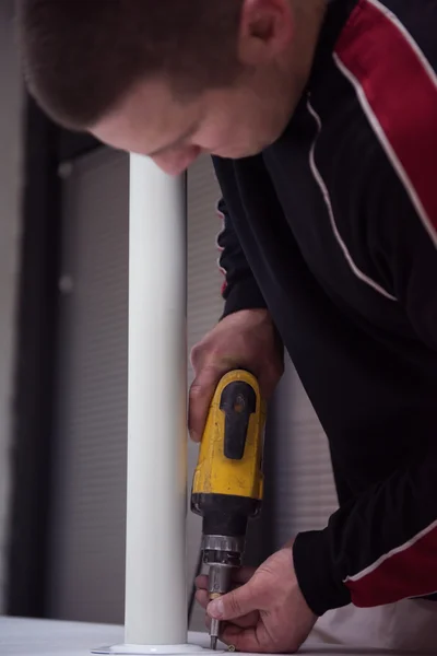 Repairman working with drilling machine — Stock Photo, Image