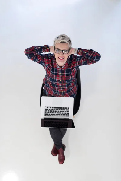 Top view of young business woman working on laptop computer — Stock Photo, Image