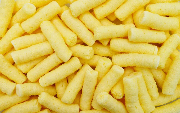 Corn puffs background — Stock Photo, Image