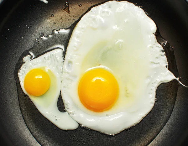 Eggs in the pan — Stock Photo, Image