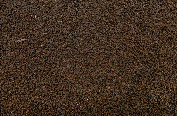 Black tea texture — Stock Photo, Image