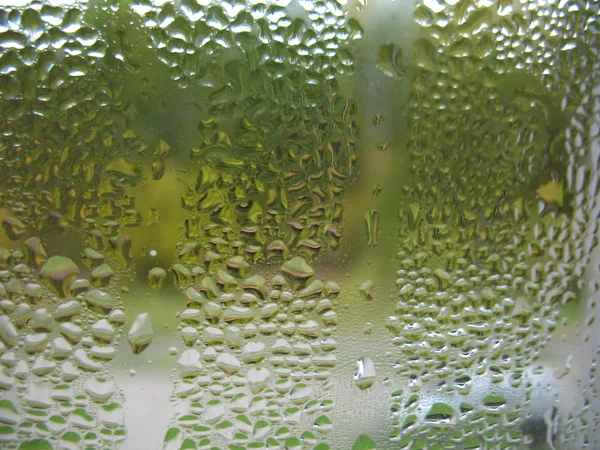 Finestra vetro e gocce di pioggia — Foto Stock