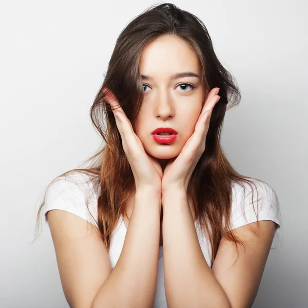 Schöne junge Frau überrascht. — Stockfoto