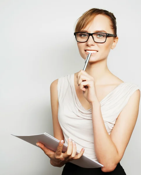 Business woman hold pages of paper — Stock Photo, Image