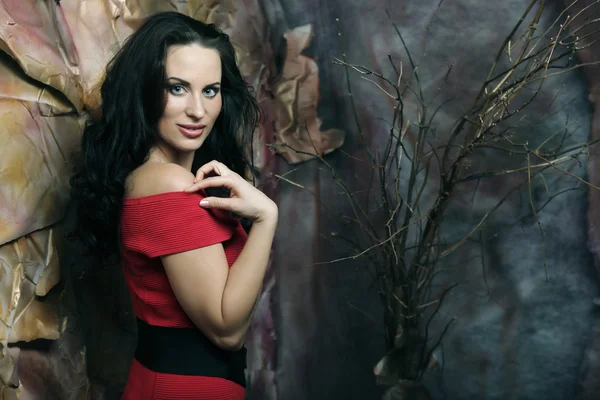 Young woman in red dress — Stock Photo, Image