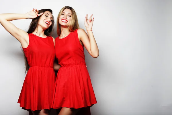 Imagem de um encantador meninas em vestido vermelho — Fotografia de Stock