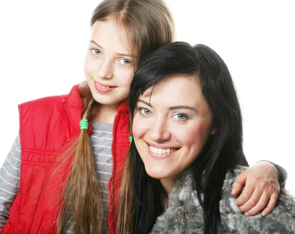 어머니와 그녀의 딸 미소를 카메라 — 스톡 사진