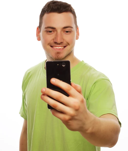 Young man making photo of himself — Stock Photo, Image