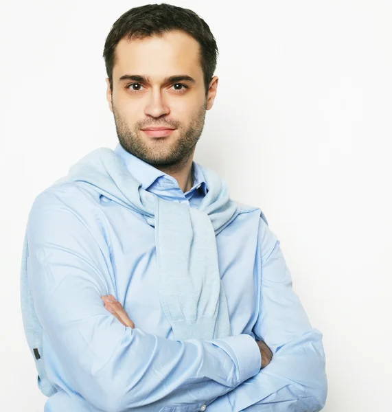 Happy young man in blue shirt. — Stock Photo, Image