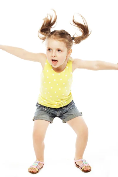 Menina salta em um fundo branco — Fotografia de Stock