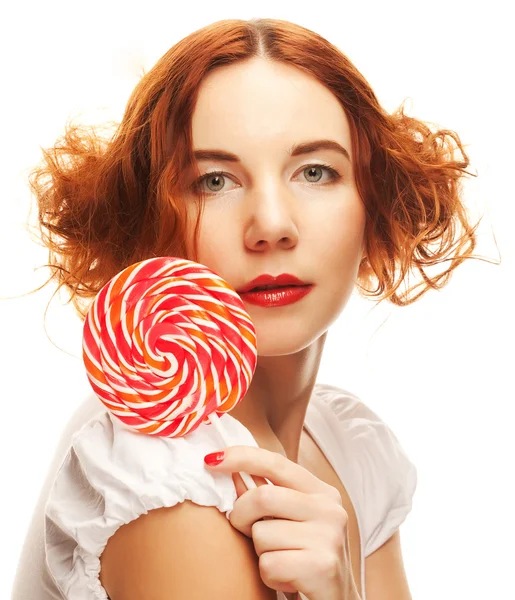 Vacker kvinna med lollipop. — Stockfoto