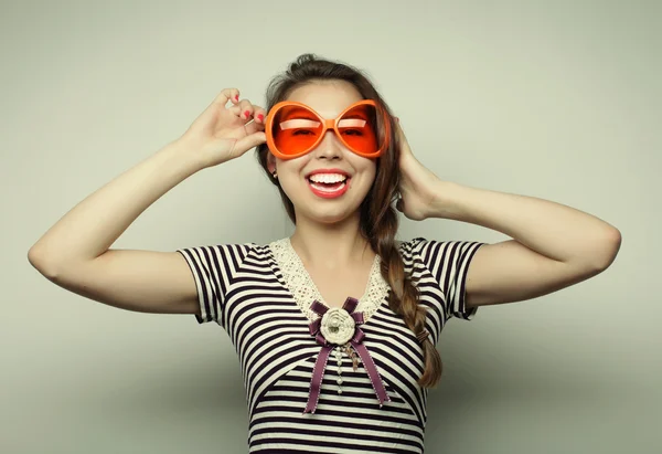 Young woman with big party glasses — Stock Photo, Image