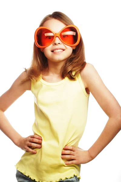 Niña con diversión naranja gafas de carnaval —  Fotos de Stock