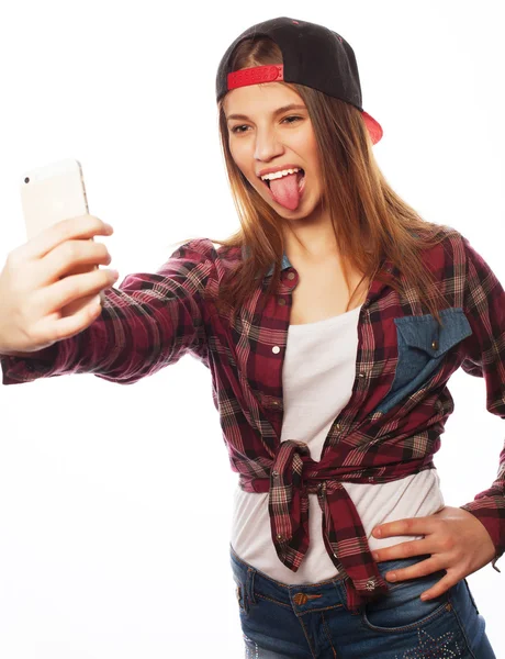 Menina bonita adolescente usando chapéu, tirando selfies — Fotografia de Stock