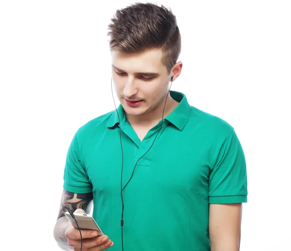 Handsome man in blank green t-shirt Stock Image