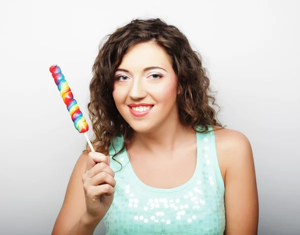 Menina agradável com lolipop — Fotografia de Stock