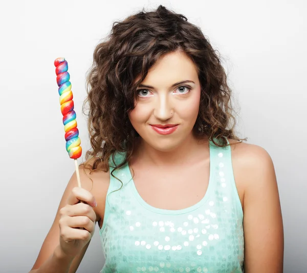 Menina agradável com lolipop — Fotografia de Stock