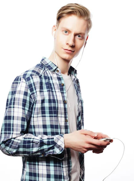 Joven escuchando música — Foto de Stock