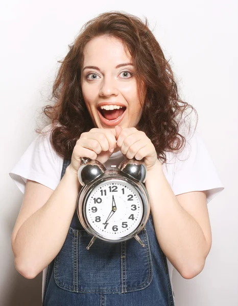 Mujer con reloj despertador —  Fotos de Stock