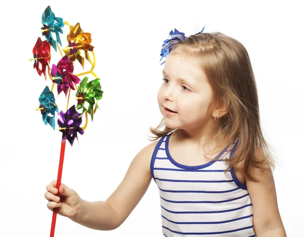 Menina com brinquedo colorido — Fotografia de Stock