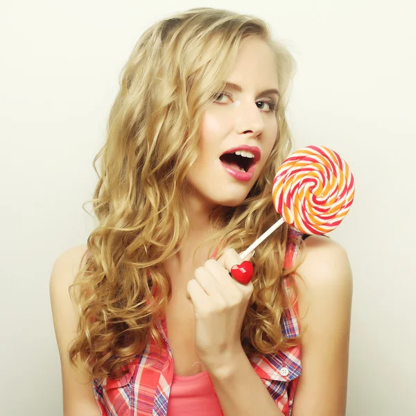 Blond  girl with  lolipop — Stock Photo, Image