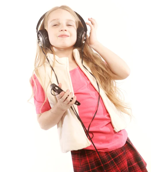 Linda niña feliz con auriculares —  Fotos de Stock