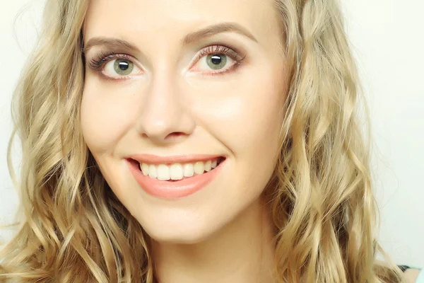 Blond girl smiling and laughing — Stock Photo, Image