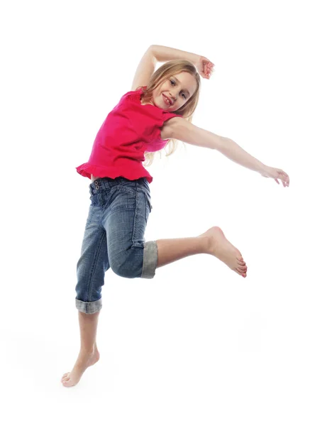 Menina salta em um fundo branco — Fotografia de Stock