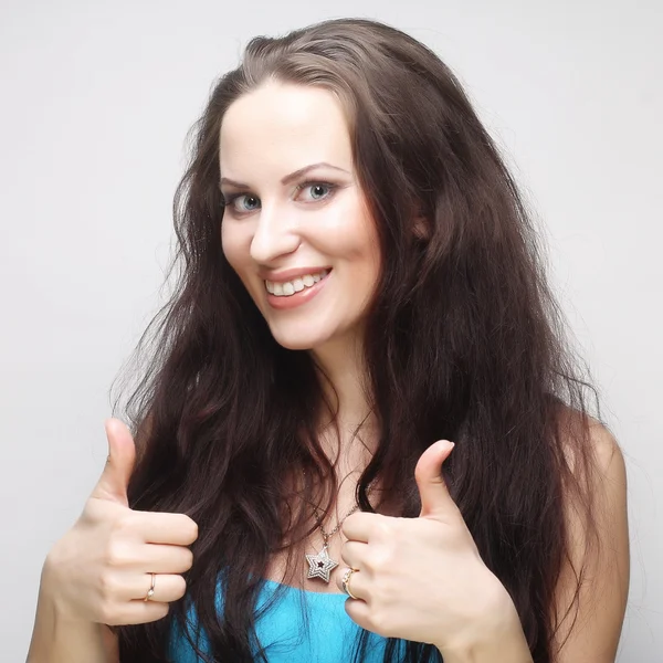 Happy woman showing thumbs up — Stock Photo, Image