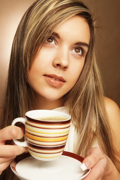 Young pretty woman drinking coffee — Stock Photo, Image